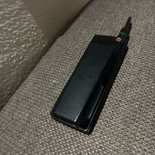 Ericsson 388 used, black, works with charger only