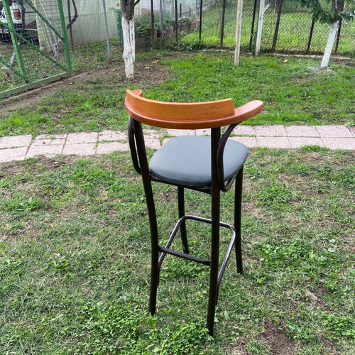 Stool like new with leatherette seat and wooden backrest
