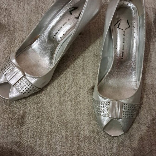 B. Rossi silver pumps size 38 used with low heel