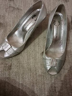 B. Rossi silver pumps size 38 used with low heel