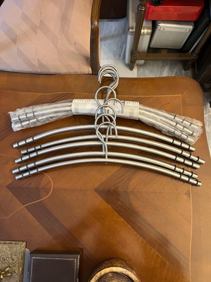 Steel hanger new with rubber washers on edges