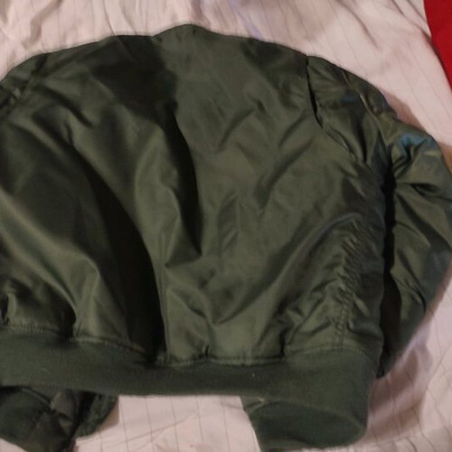 Flight jacket with embroidered patches like new, size 12