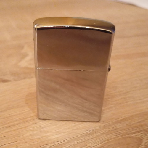 Oil lighter used carved with skull design