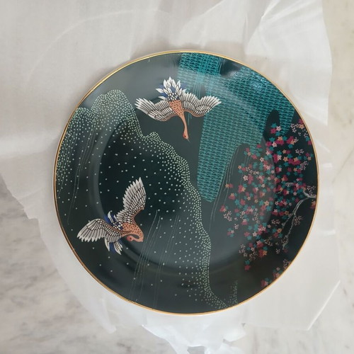 Plates set of 4 new with Chinese design