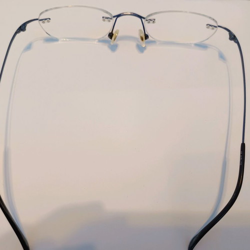 Titanium eyeglass frame used, blue color