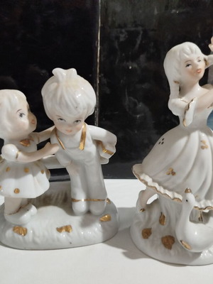 Porcelain figurines set used, young girl with goose and children