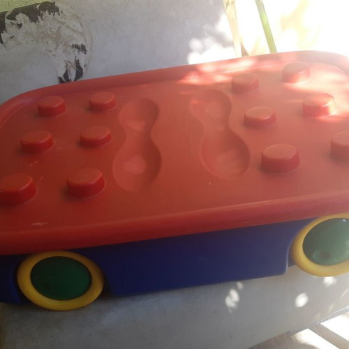 Plastic storage box for toys used with wheels