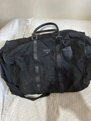 Prada travel bag like new, large black with handles and shoulder strap