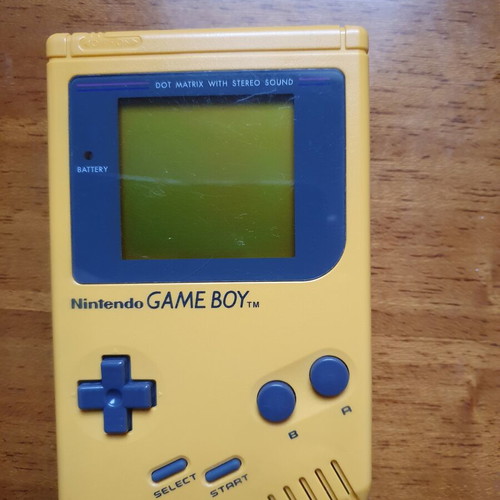Game Boy DMG Play It Loud Edition used with Tetris cartridge