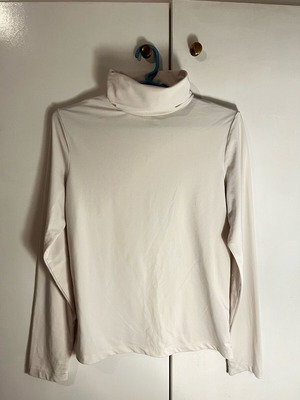 White turtleneck blouse used, size M-L