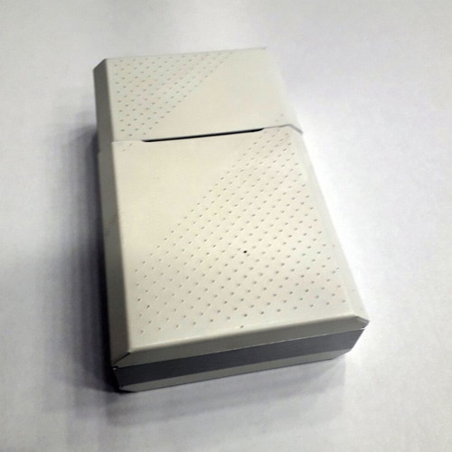 Plastic cigarette pack case used, white and silver