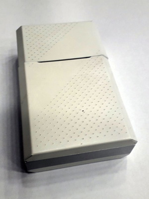 Plastic cigarette pack case used, white and silver