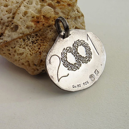 Silver pendant Nikos Eggonopoulos 925 with ruby like new, lucky charm 2001