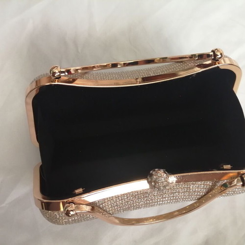 Elegant clutch bag gold color new