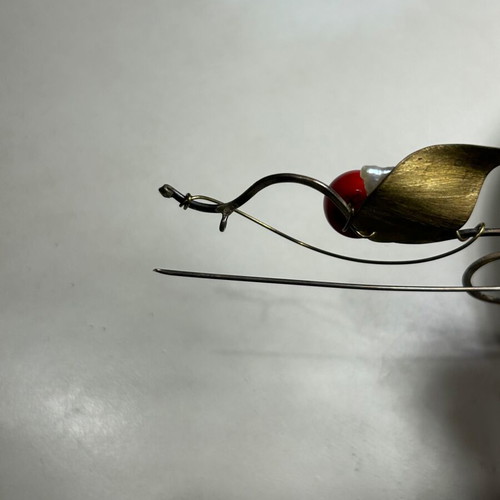 Alternative metal pin used, red and gold colors