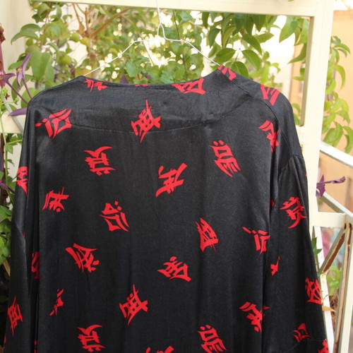 Black kimono with red ideograms like new