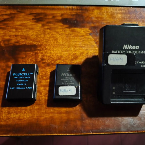 Nikon D5200 DSLR with Nikkor 35mm f/1.8G lens and accessories