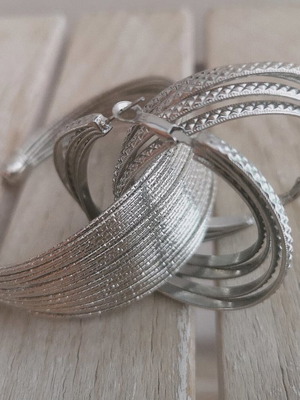 Bracelet with hoop earrings new, silver steel set