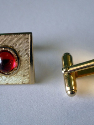 Cufflinks set used, vintage design, gold color with red stone