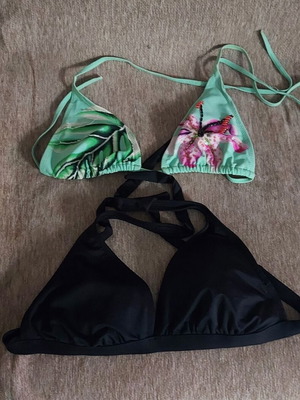 Two bikini top swimsuits used, sizes XL and L, black and multicolor