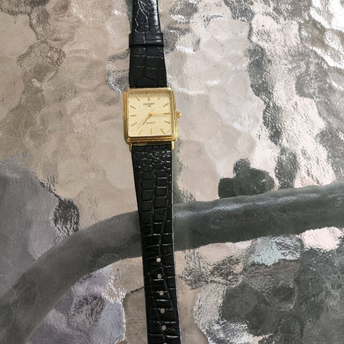 Vintage Orient watch used with leather strap