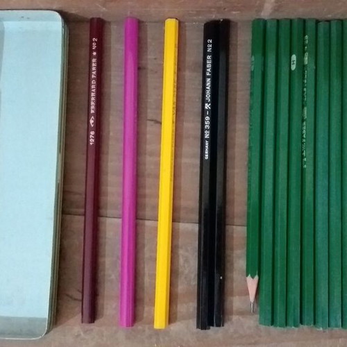 Faber collectible pencils and tin box like new