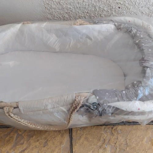 Knitted bassinet like new with mosquito net