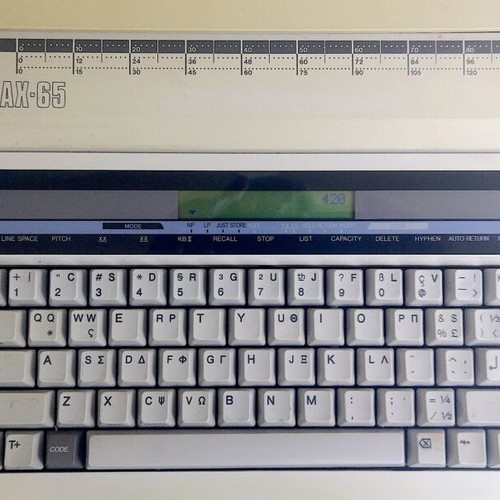 Nakajima AX-65 portable electronic typewriter used, Greek-English