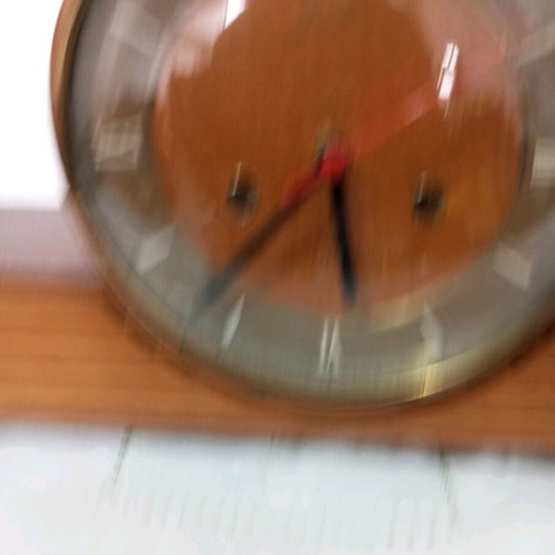 Wooden vintage table clock used, battery operated and functional