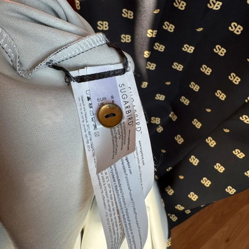 Sugarbird dress with buttons black with gold logo like new