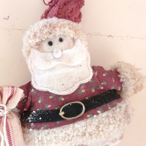 Handmade knitted Christmas ornaments used, Santa and reindeer