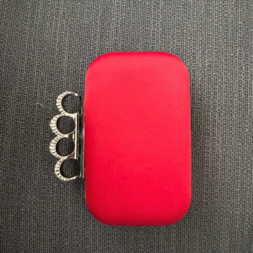 Red clutch like new with decorative clasp and chain