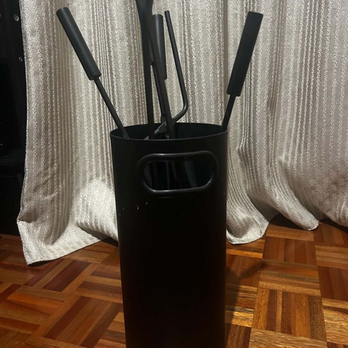 Fireplace screen trifolding with tool set used