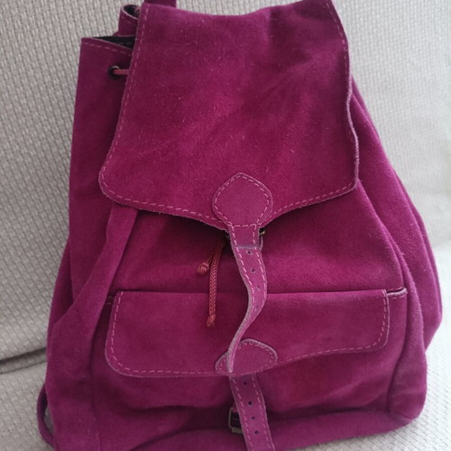 Leather backpack fuchsia used with some wear