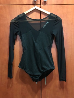 Black long-sleeve bodysuit used with transparency