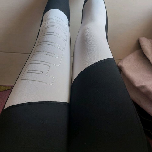 Puma leggings used, white and black, women's size M