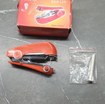 Mini handheld sewing machine like new, portable manual
