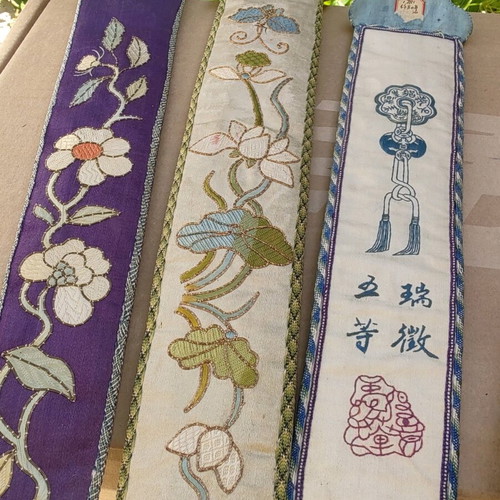 Chinese sticks like new with carved wooden cases and embroidered 19th-century cloths