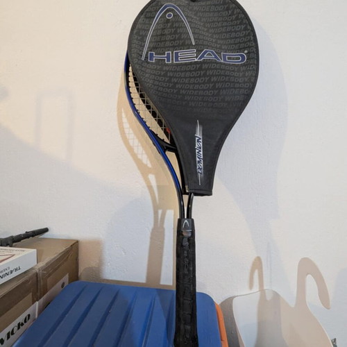 HEAD tennis racket with balls used