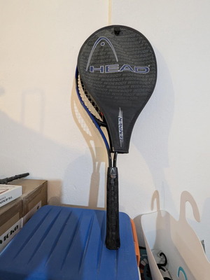 HEAD tennis racket with balls used