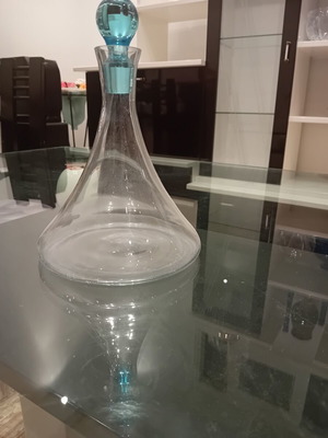 Glass carafe with turquoise spherical stopper, used