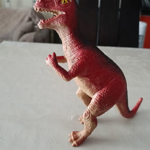 Set of 24 dinosaur figures in various sizes