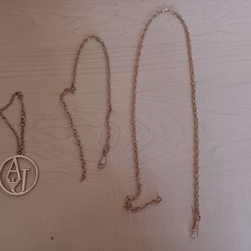 Bag decorations like new, gold color