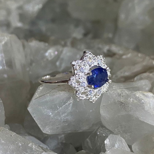 Handmade silver ring with natural blue sapphire and moissanites