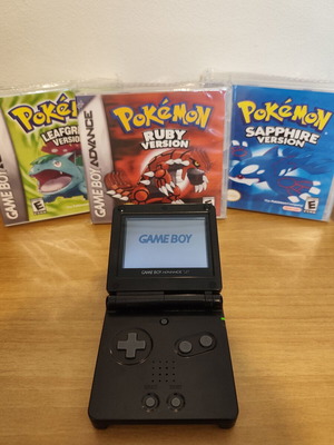 Nintendo Game Boy Advance SP Onyx Black console with 3 Pokemon games