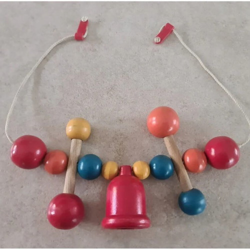 Vintage wooden stroller toy.