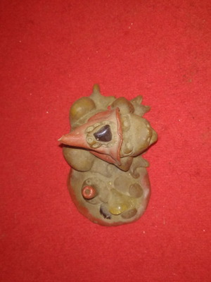 Incense stick holder used, bamboo and baked clay with frog design