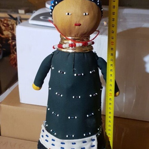 Handmade doll like new, unique with beads
