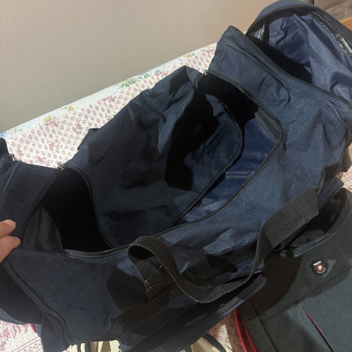 Set of 3 bags used, 1 50L duffel and 2 backpacks
