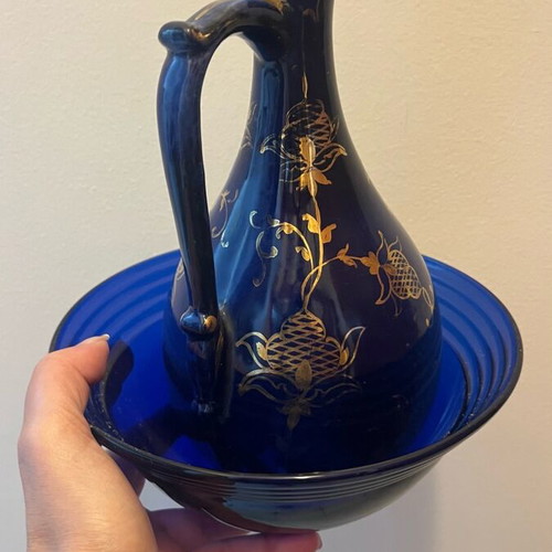 Decorative bottle used, blue glass with gold details